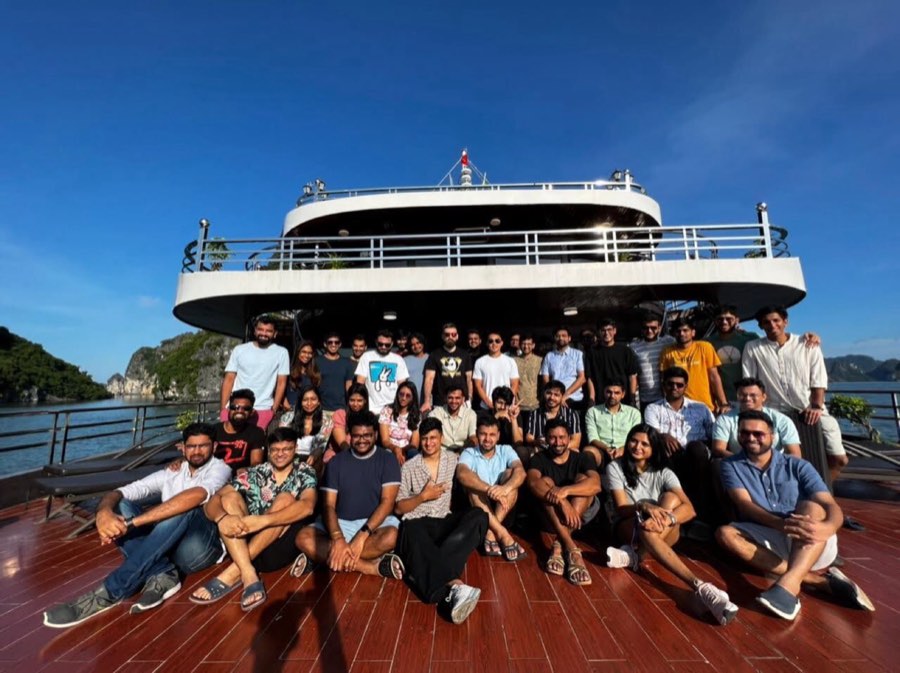 The team on a boat in Ha Long Bay